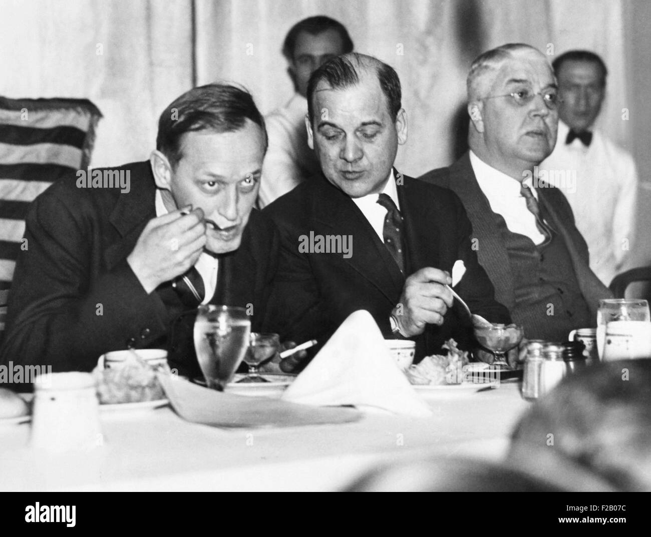 Harry Hopkins dining and smoking with politicians in May, 1935. L-R: Harry Lyman Davis, Mayor of Cleveland; Stanley Orr; Harry Hopkins. (CSU 2015 9 1253) Stock Photo