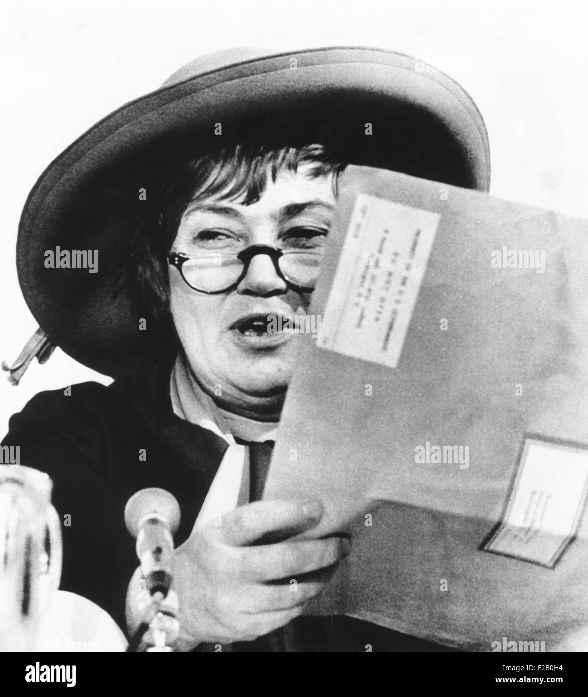 Congresswoman Bella Abzug held her CIA file, built since 1963, when she was a lawyer. March 5, 1975. At a House Committee hearing on privacy rights, she had an angry exchange with CIA Director William Colby. (CSU 2015 9 1115) Stock Photo