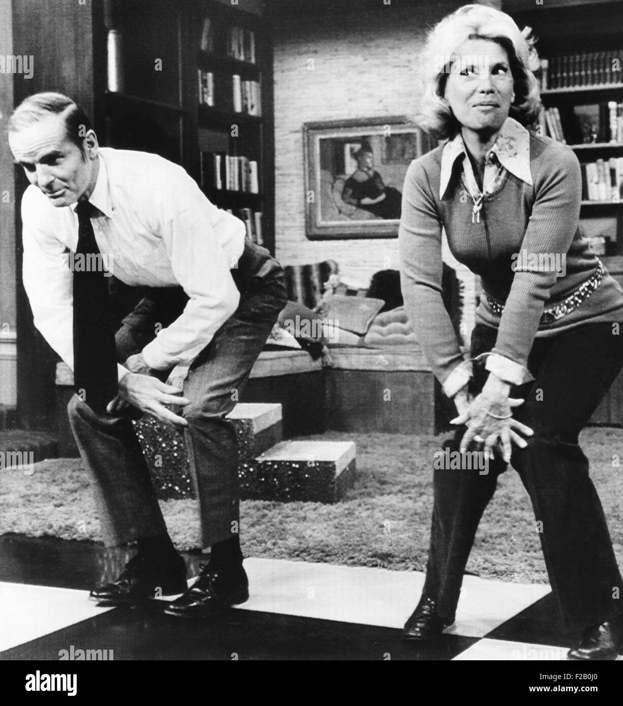 Senator William Proxmire does the Charleston with Dinah Shore on NBC-TVs 'Dinah's place'. Dec. 1, 1972. In his book, 'Last of the Big Time Spenders,' Proxmire discussed government waste, physical fitness, and his recent hair transplant. (CSU 2015 9 1095) Stock Photo