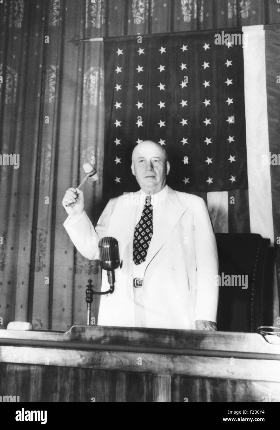 Speaker Sam Rayburn on the rostrum of the House Ways and Means Committee room. July 5, 1949. The House of Representative was moved while the roof of the their Capitol chamber was repaired. (CSU 2015 9 1034) Stock Photo