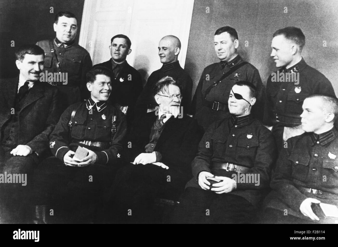 Soviet Union honors border guards who fought Japanese-Manchurian troops, ca. Dec. 1935-March 1936. Mikhail Kalinin (center), President of the Central Executive Committee of the USSR, and Vlas Chubar (far left, seated), Vice Chairman of the Council of the People's Commissars of the USSR. (CSU 2015 8 668) Stock Photo