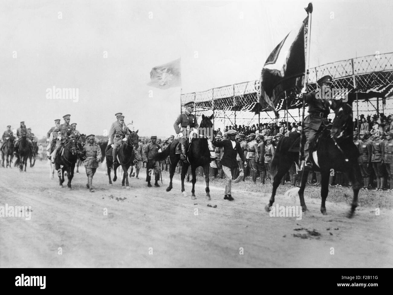 Chiang Kai-shek of the Chinese Nationalists following flag bearer in military procession, 1931. The Nationalist fought the Communist insurgency until the Civil War was interrupted by the Japanese invasion in 1937. (CSU 2015 8 661) Stock Photo