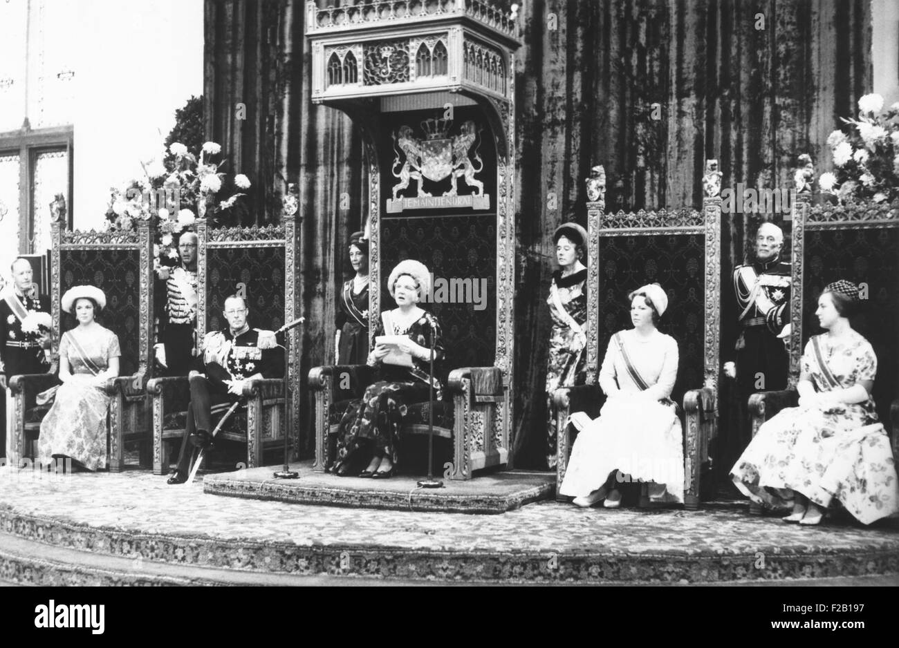 Queen Juliana delivers 'Speech from the Throne' at the state opening of Dutch legislature. Sept. 21, 1961. Seated, L-R: Princess Irene, Prince Bernhard, Queen Juliana, Princess Beatrix and Princess Marguerite. (CSU 2015 8 646) Stock Photo