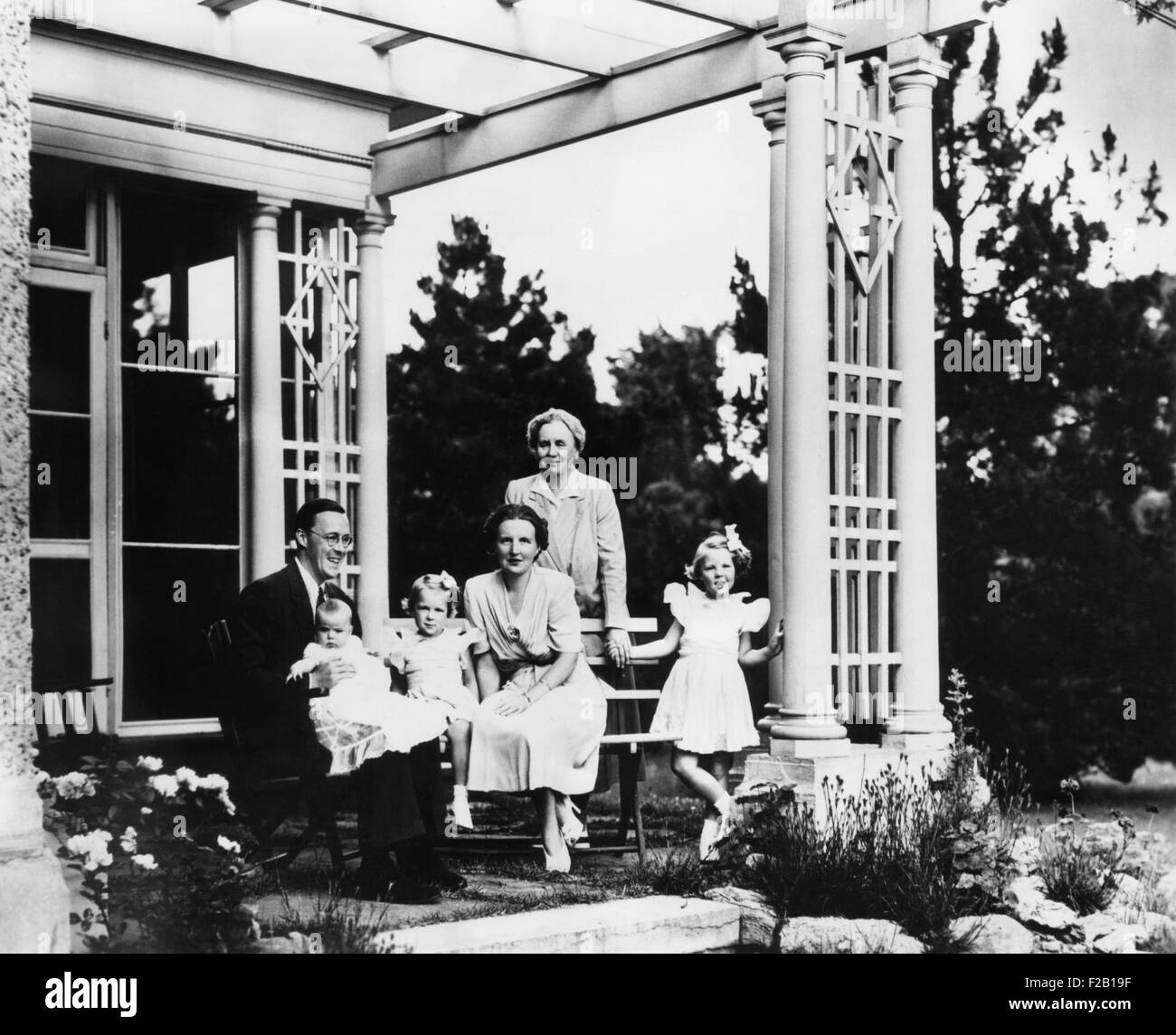 The exiled Dutch Royal Family celebrate Queen Wilhelmina's birthday on Aug. 31, 1943 in Canada. During World War II, L-R: Prince Bernhard, holding Princess Marguerite Francisca; Princess Irene; Crown Princess Juliana; Queen Wilhelmina; and Princess Beatrix. (CSU 2015 8 640) Stock Photo