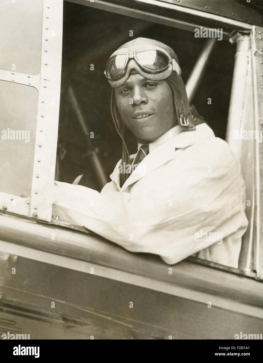 Hubert Julian was the only licensed Black aviator in America. He is in the cockpit of a Bellanca Roma, in his first flying exhibition at the Bellanca field, at Newcastle, Delaware, August 2, 1931. He was sponsored by Giuseppe Mario Bellanca, the famous plane designer. (CSU 2015 8 634) Stock Photo