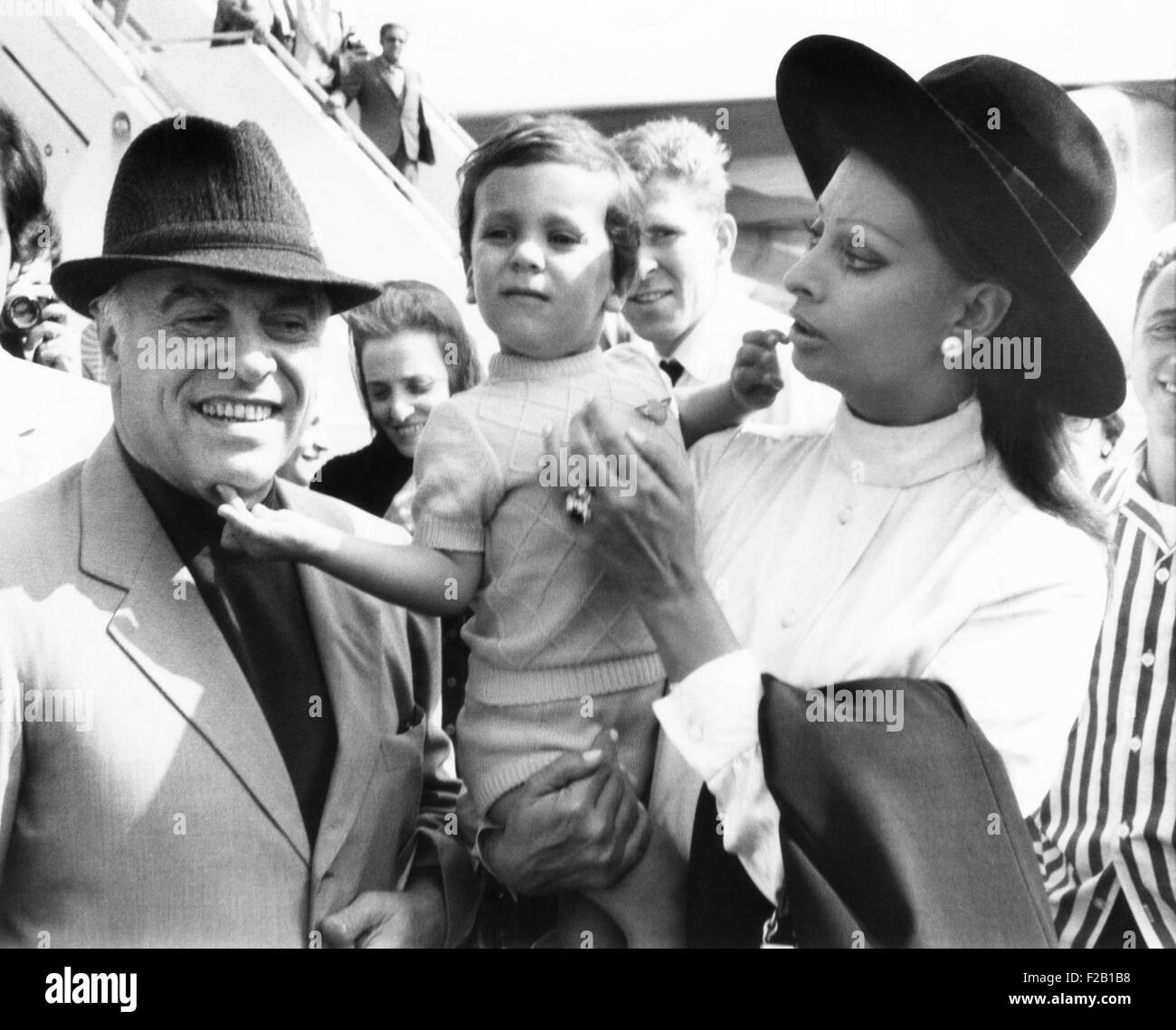 Carlo Ponti, Jr. arrives in New York with his famous parents: Italian film producer, Carlo Ponti Sr., and actress Sophia Loren. Stock Photo