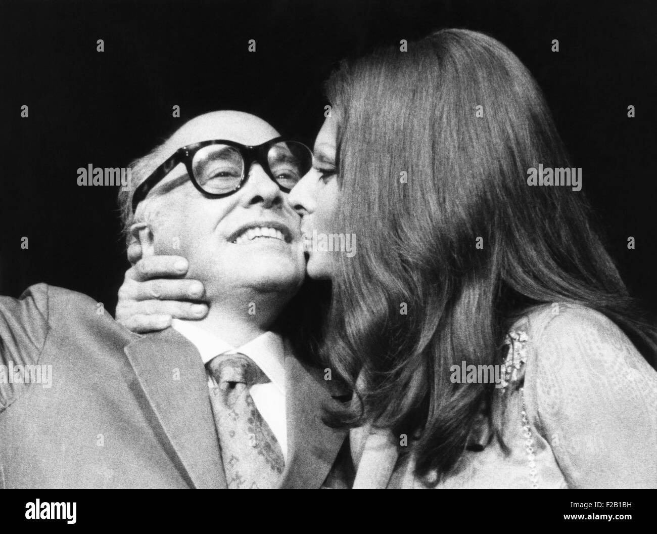 Sophia Loren gives her husband, film producer Carlo Ponti, a kiss at press conference. They were in New York to promote Sophia Loren's film SUNFLOWER, Sept. 24, 1970. (CSU_2015_8_613) Stock Photo