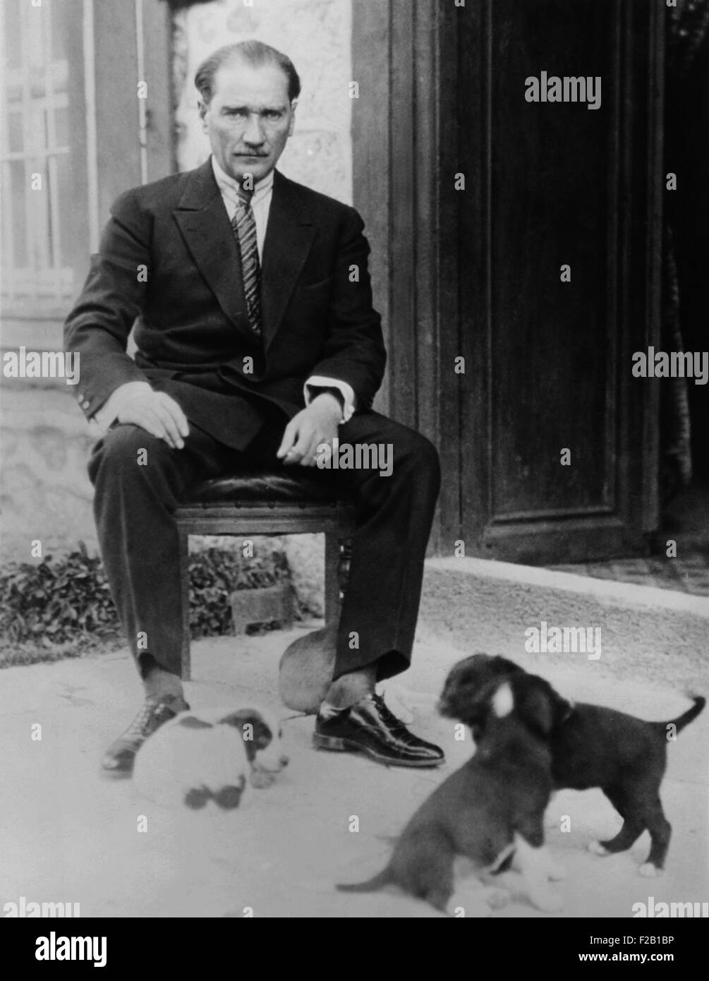 Mustafa Kemal Ataturk, President of Turkey, with his pet dogs, ca. 1930. As part of Kemal's modernization and Westernization of Stock Photo