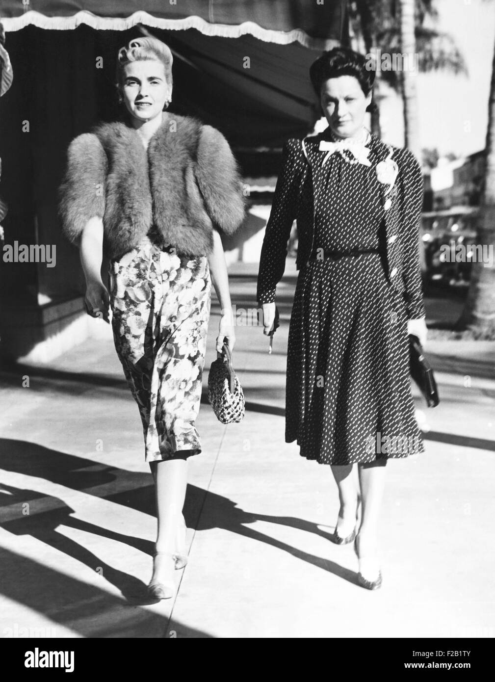 Barbara Hutton (left), Countess Von Haugwitz-Reventlow, on Worth Avenue in Palm Beach. Wearing a fashionable silver-fox jacket, Stock Photo