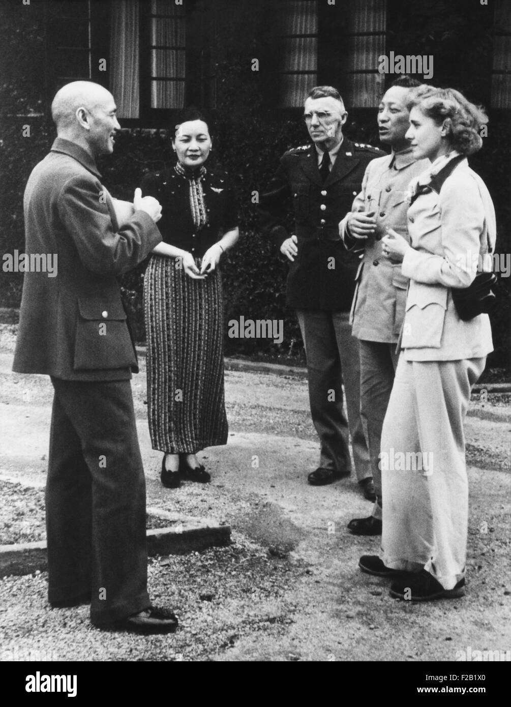 Chinese leader and Americans together after the after the Doolittle Raid on Japan. April 19, 1942. L-R: Chiang Kai-shek, Mme. Chiang Kai-shek (Soong May-ling), U.S. Gen. Joseph Stilwell, unidentified Chinese officer, and Clare Booth Luce with Chiang Kai-shek (CSU 2015 8 577) Stock Photo
