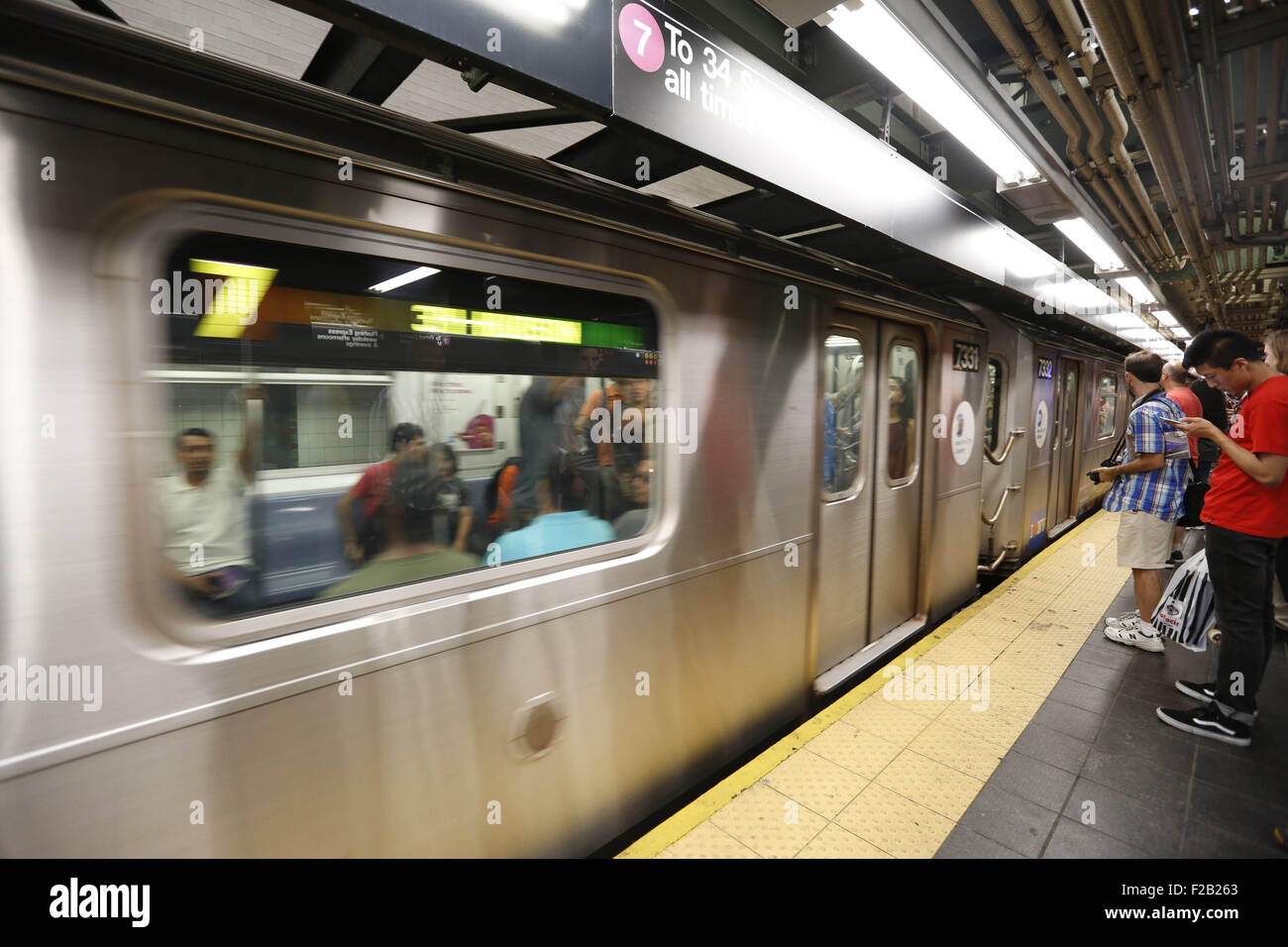 Manhattan, New York, USA. 13th Sep, 2015. A No. 7 train leaving the Times Square station on its way to the new 34th Street-Hudson Yards No. 7 station, in the Far West Side of Manhattan, NY. The new subway station, part of the 7 subway extension for the IRT Flushing Line of the New York City Subway, is located at 34th Street near 11th Ave and cost $2.4 billion to complete. It is the 469th station and the first completely new station to be opened in 25 years. © Angel Chevrestt/ZUMA Wire/Alamy Live News Stock Photo