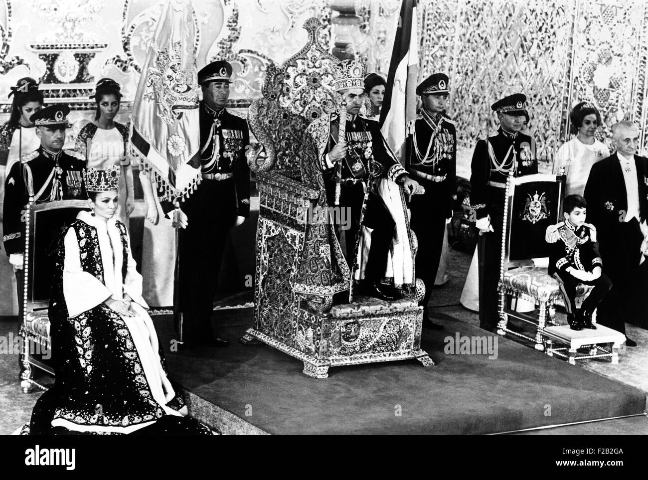Shah of Iran seated on the Peacock Throne, flanked by Empress Farah and Crown Prince Reza. Oct. 26, 1967. (CSU 2015 8 522) Stock Photo