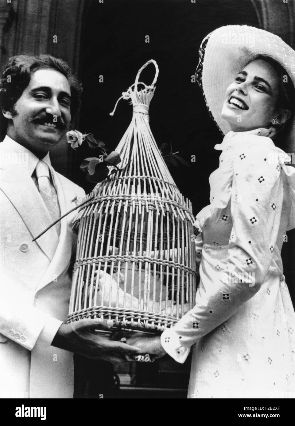 Margot Hemingway marries Errol Whitson, in Paris June 21, 1975. The top model and aspiring actress was the granddaughter of novelist Ernest Hemingway. The couple posed with two caged doves after their wedding. (CSU 2015 7 307) Stock Photo