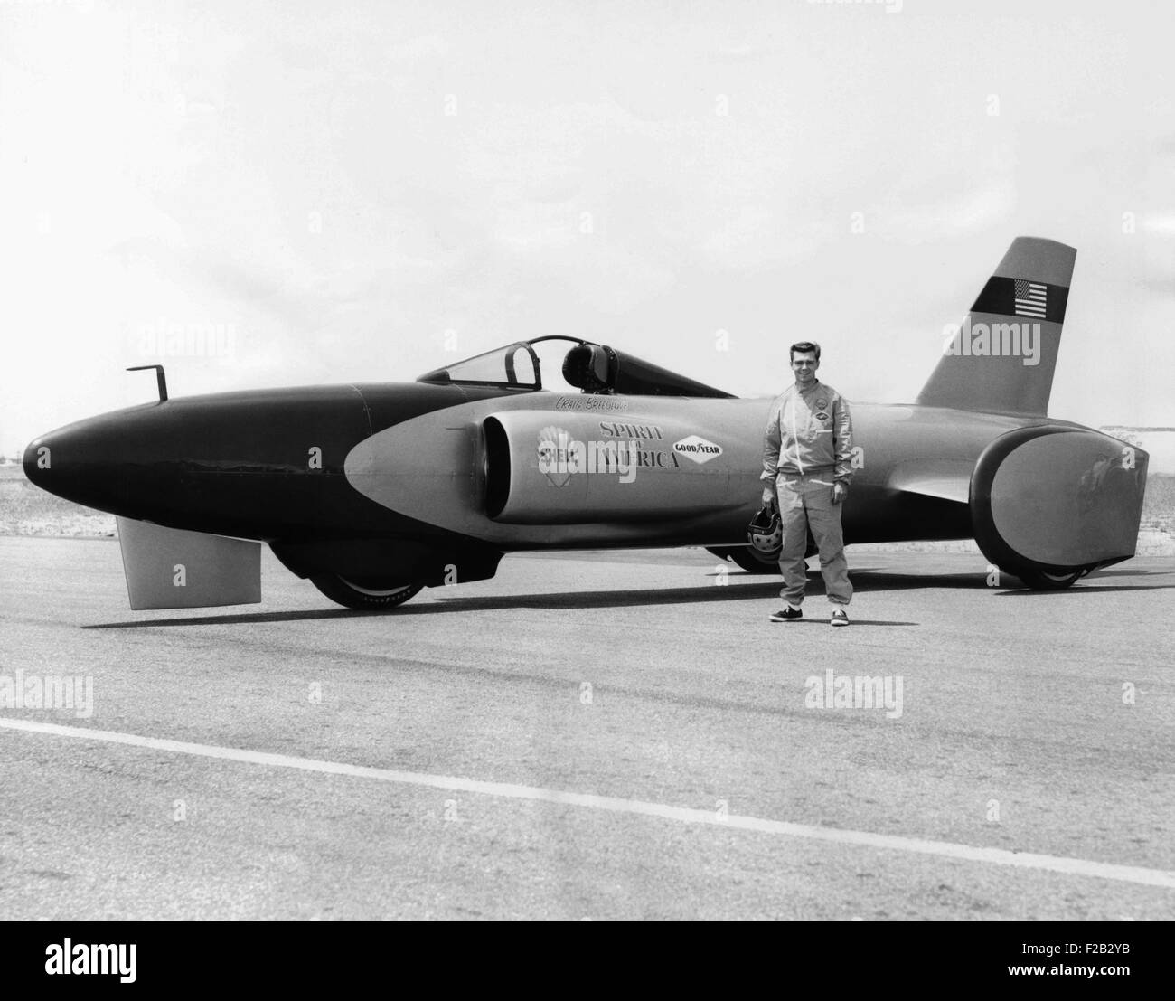 Craig Breedlove stands beside his jet car 'Spirit of America' on the Bonneville Salt Flats in Utah. July 25, 1963. Breedlove set a new land speed record of reached 407.45 mph on Aug. 5, 1963. (CSU 2015 8 465) Stock Photo