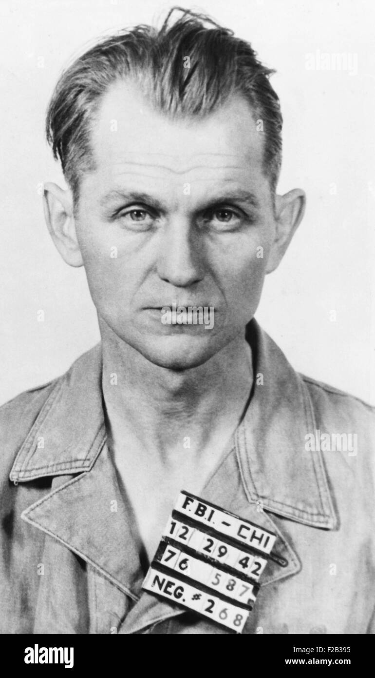 Basil ‘the Owl’ Banghart, surrendered to FBI shortly after G-men killed two members of the gang. He was arrested with Roger Touly, in Chicago on Dec. 29, 1942. He had been at-large since escaping from Statesville prison last Oct. 9, 1942. He was ensnarled in the fake John Factor kidnapping, and sentenced to prison, as was Roger Touly. - (CSU 2015 6 240) Stock Photo