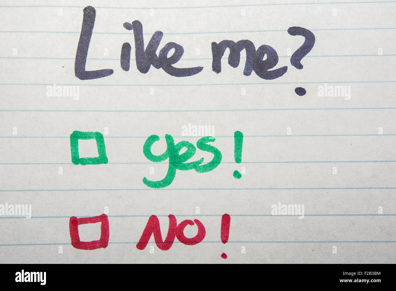 Like me, yes or no written on piece of paper Stock Photo - Alamy