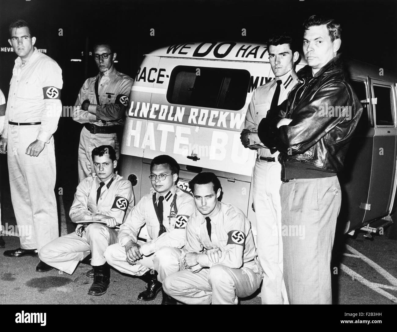 George Lincoln Rockwell (right) poses with the American Nazi party 'Hate Bus', May 22, 1961. The van carried 12 party members from Virginia to New Orleans, to add their radical right resistance to the Civil Rights Movement. On the bus in big red letters were slogans saying, ‘We do hate race mixing’ and ‘We hate Jew Communism’. - (CSU 2015 6 206) Stock Photo