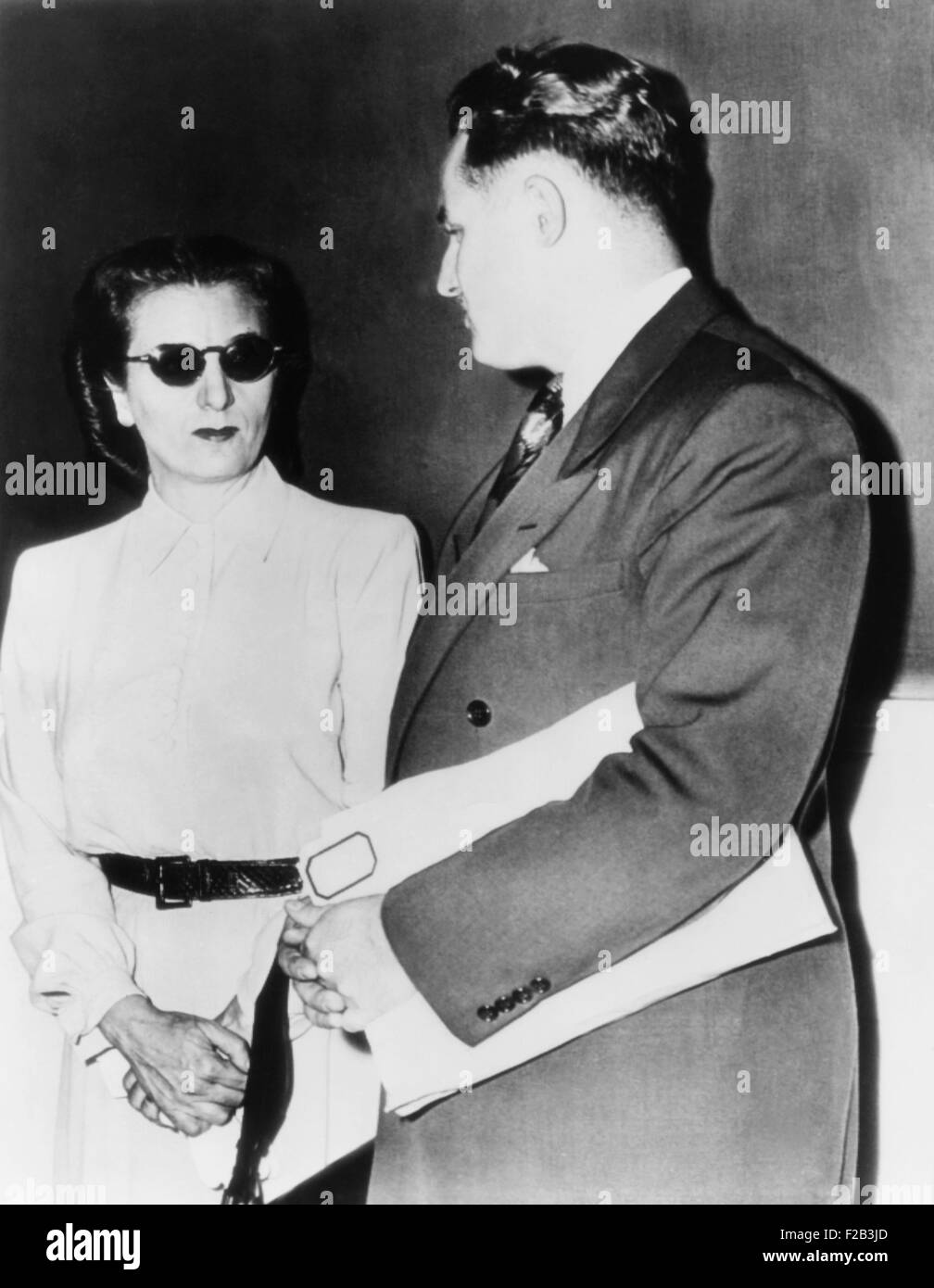 Annette Carvetto, widow of mob boss Frank Nitti, with her lawyer J. R. Stibel. She was subpoenaed to U.S. District Court over income taxes owed the government. August 1, 1946. Nitti was portrayed by Sylvester Stallone in CAPONE 1975; by Stanley Tucci in ROAD TO PERDITION 2002; and by Bill Camp in PUBLIC ENEMIES 2009 . - (CSU 2015 6 184) Stock Photo