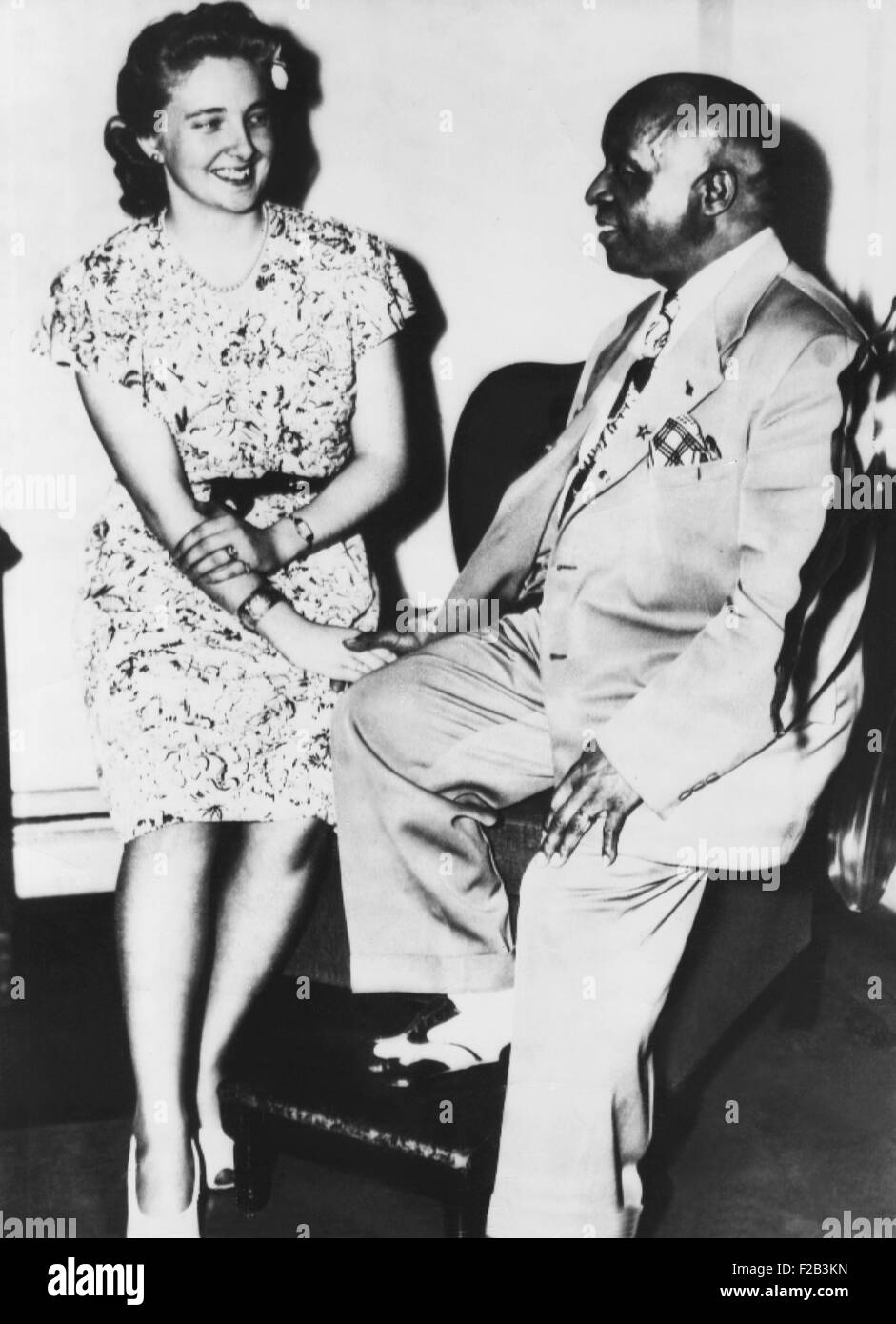 Father Divine, Cult leader and his 21 year old white bride, Edna Ritchings of Vancouver B.C. She agreed to the standard Peace Mission Movement celibate marriage. Newark New, Jersey, Aug. 8, 1946. Edna Ritchings, introduced as the reincarnation of Sister Penny, was also called Mother Divine, was the symbolic maintainer of the International Peace Mission movement into the 21st century. - (CSU 2015 5 80) Stock Photo