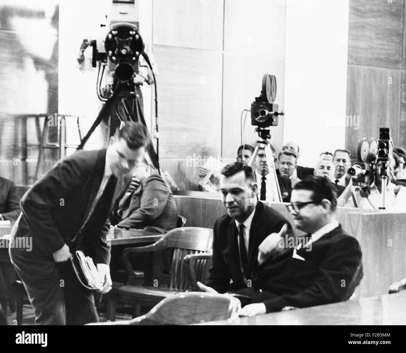Billie Sol Estes sits at right as television cameras record the proceedings of his 1962 trial. On June 7, 1965, the Supreme Court reversed Estes conviction because parts of his state trial were televised. The court divided 5-4 on the question of reversal. Photo shows Texas financier Billy Sol Estes (foreground) sitting in court during his 1962 trial for fraud on Sept. 24, 1962. He later argued that camera coverage of the trial deprived him of due process. The U.S. Supreme Court agreed, and overturned the conviction. - (CSU 2015 5 58) Stock Photo