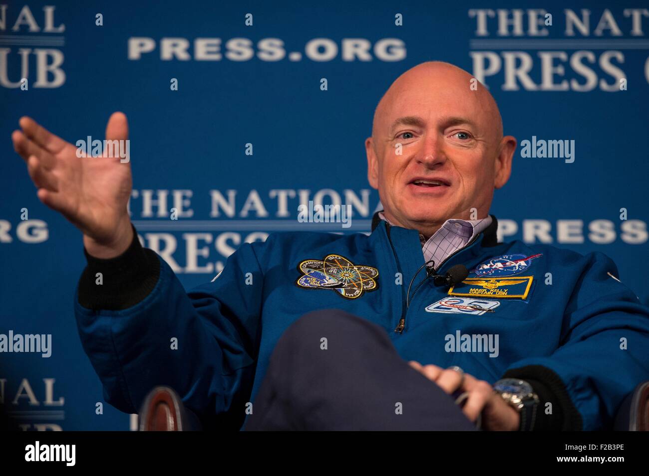 NASA retired Astronaut Mark Kelly talks during a discussion at the National Press Club with a satellite uplink to his twin bother, Scott Kelly who is currently onboard the International Space Station September 14, 2015 in Washington, DC. Stock Photo