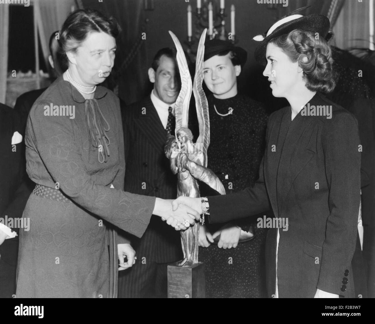 Jacqueline Cochran receives Aviation award. Mrs. Franklin Roosevelt presented to Jacqueline Cochran (right) the trophy of the International League of Aviators and Aviatrix for 1937. April 4, 1937 - (CSU 2015 5 36) Stock Photo