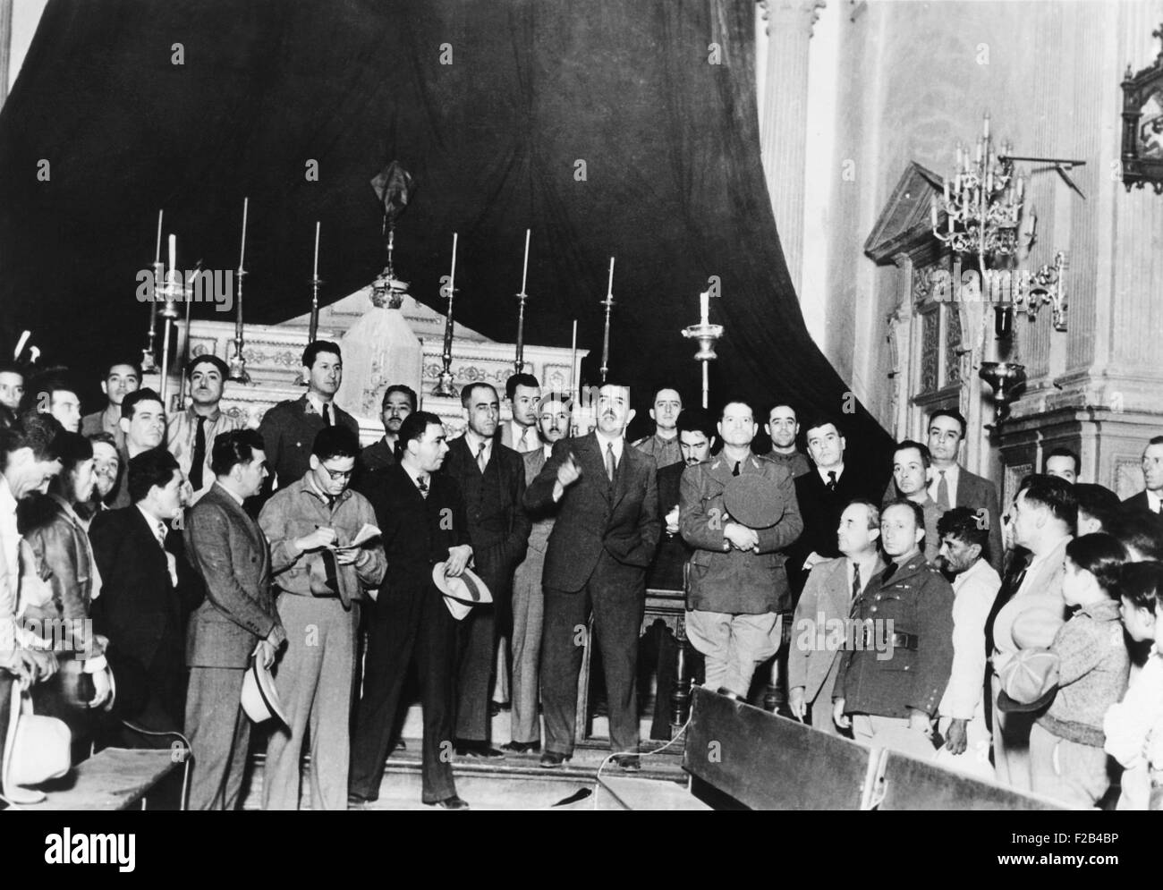 President Lazaro Cardenas at riot scene where 14 were killed and 15 badly injured. April 4, 1936. Federal Troops and Police participated in the riot, which Cardenas blamed on three Catholic priests who opposed the government's modern secular schools that weakened the influence of the Catholic Church. April 4, 1936. - (CSU 2015 5 11) Stock Photo