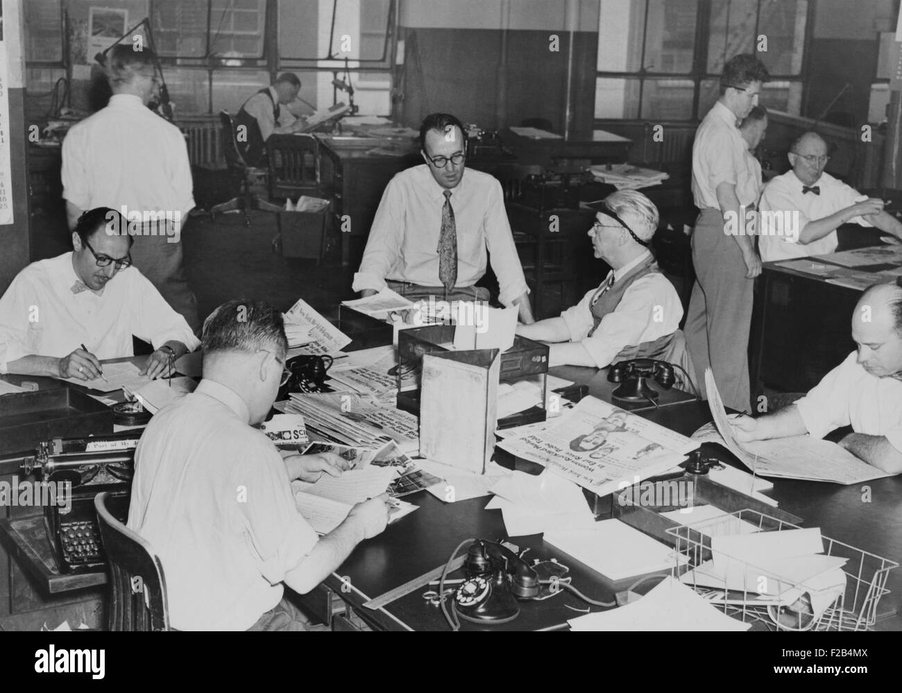 The City Desk, the department that handled local news. In the offices of the New York World-Telegram and the Sun Newspaper. May Stock Photo