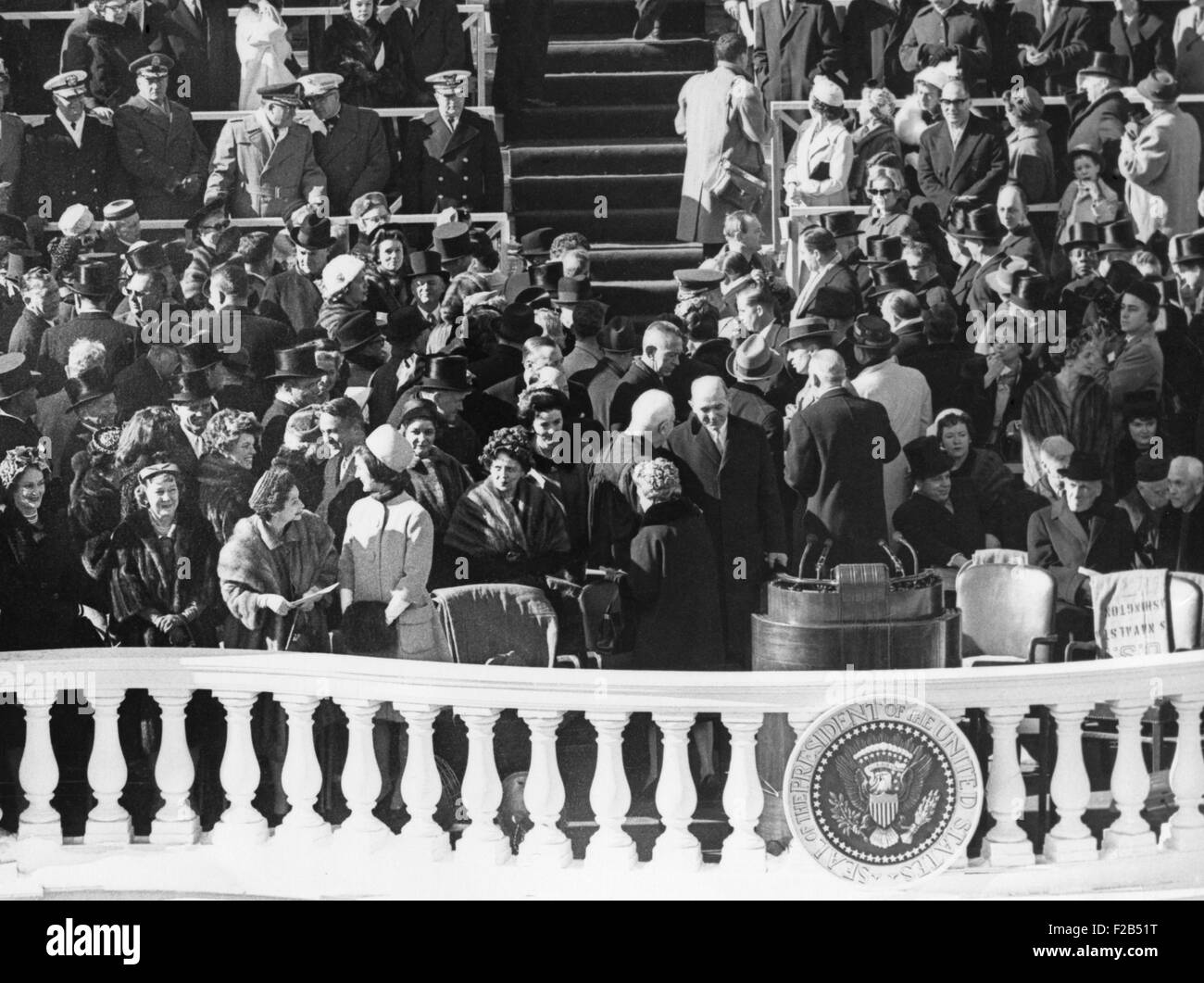 Guests talk and mingle before the Inauguration ceremony of President John Kennedy. Jacqueline Kennedy talks with Lady Bird Johnson as they await arrival of President-elect John F. Kennedy and Vice President-elect Lyndon B. Johnson. Behind them: John F. Kennedy's sister Eunice Kennedy Shriver; her husband R. Sargent Shriver; and Attorney General-designate Robert F. Kennedy. Jan. 20, 1961. - (BSLOC 2015 1 143) Stock Photo