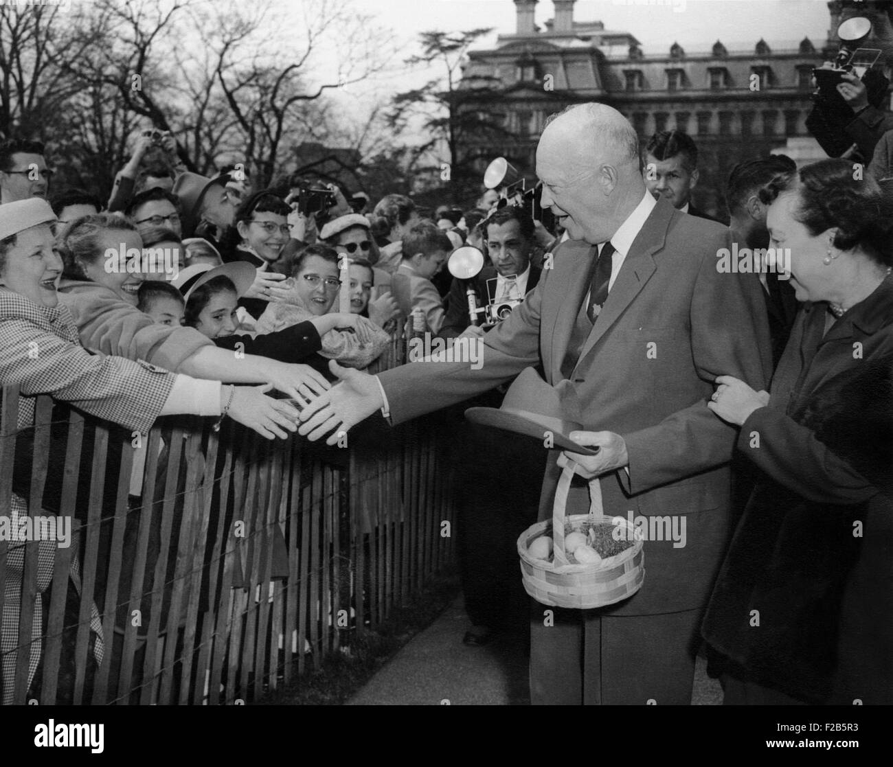 President Dwight and Mamie Eisenhower greeting citizens on during the annual Easter Egg Roll. Ca. 1953-1960 - (BSLOC 2014 16 89) Stock Photo