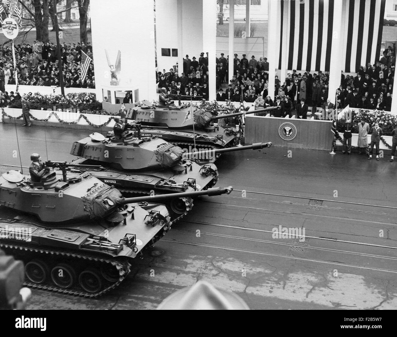 U.S. Army tanks pass Eisenhower's reviewing stand during the Inaugural parade. Jan 21, 1957. - (BSLOC 2014 16 38) Stock Photo