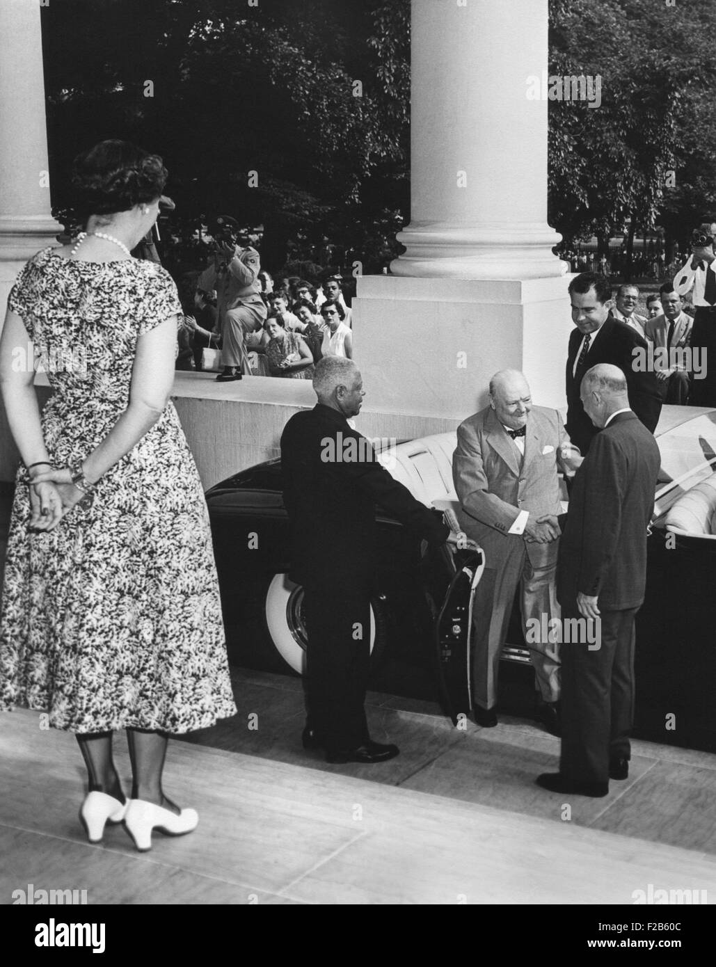 President Eisenhower welcomes Prime Minister Winston Churchill of Britain at the White House. First Lady Mamie Eisenhower stands at top of stairs. Richard Nixon is in the car. June 25, 1954. - (BSLOC 2014 16 202) Stock Photo