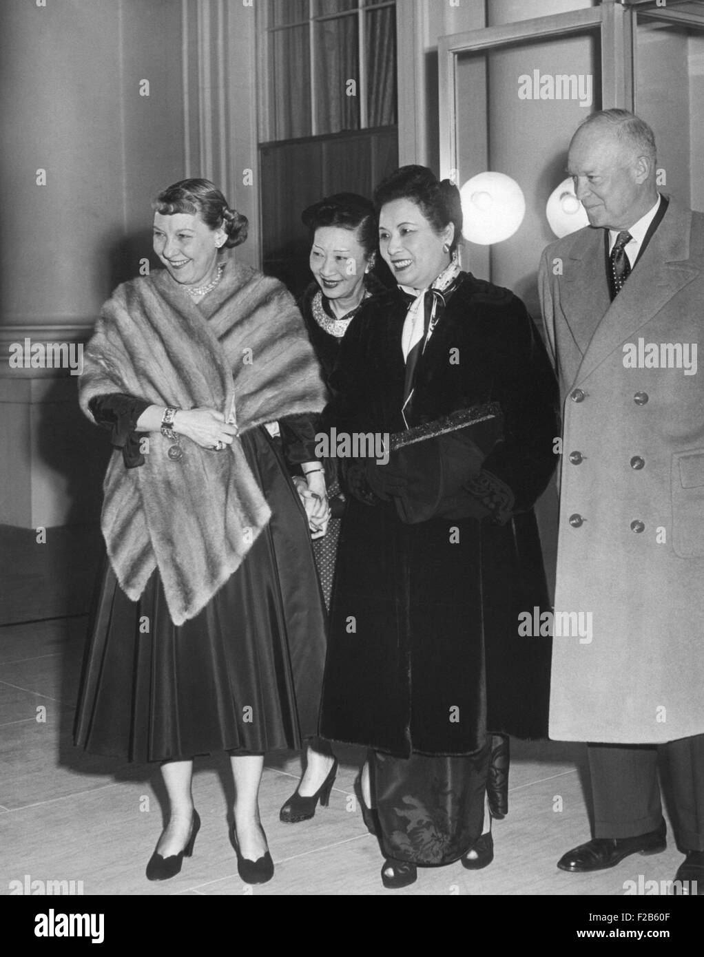 President and First Lady Mamie Eisenhower gave an informal tea for Madame Chiang Kai-shek. Pictured with her is Mrs. Wellingon Koo, wife of the Rep. of China. Ambassador to the U.S. March 9, 1953. - (BSLOC 2014 16 200) Stock Photo