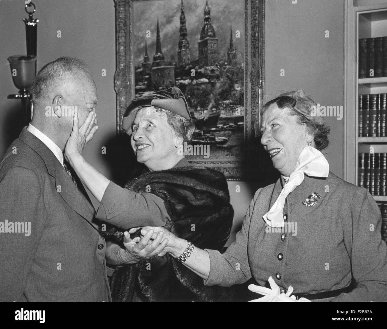 President Eisenhower with Helen Keller and her aide Polly Thompson. November 3, 1953. Patty Duke played Helen Keller in THE MIRACLE WORKER, a 1962 film about Keller's the early education. - (BSLOC 2014 16 168) Stock Photo