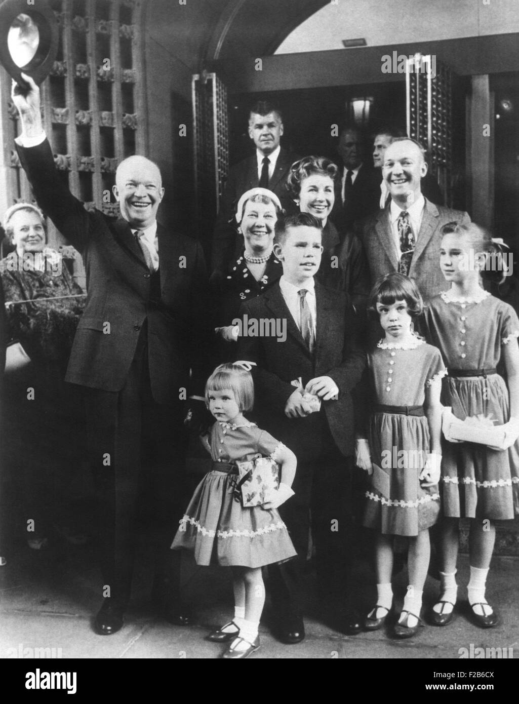 President and Mamie Eisenhower with their son John, his wife Barbara and four children leaving church. Ca. 1958. L-R: The President, Mary Jean, Mamie, David, Barbara, John, Susan, and Barbara Ann. - (BSLOC 2014 16 105) Stock Photo
