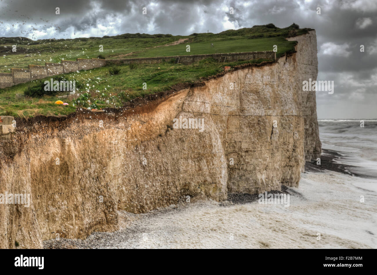 Birling Gap, East Sussex, UK..15 September 2015..Gale force winds blow Sea Foam up the Cliff face on the South Coast..HDR.. Stock Photo