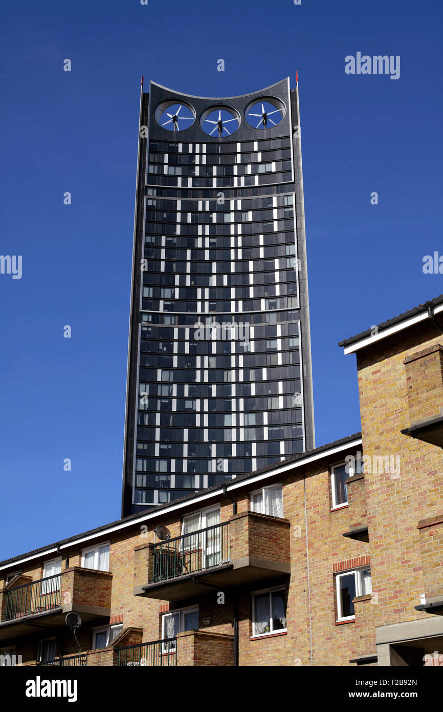 The Strata building towers over low rise housing on the Newington Estate, Elephant and Castle, London. Stock Photo