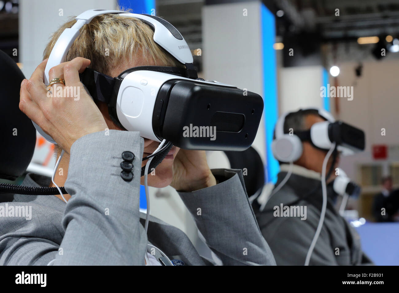 Frankfurt/M, 15.09.2015 - Visitors take a virtual test drive with masks at the Ford stand at the 66th International Motor Show IAA 2015 (Internationale Automobil Ausstellung, IAA) in Frankfurt/Main, Germany Stock Photo