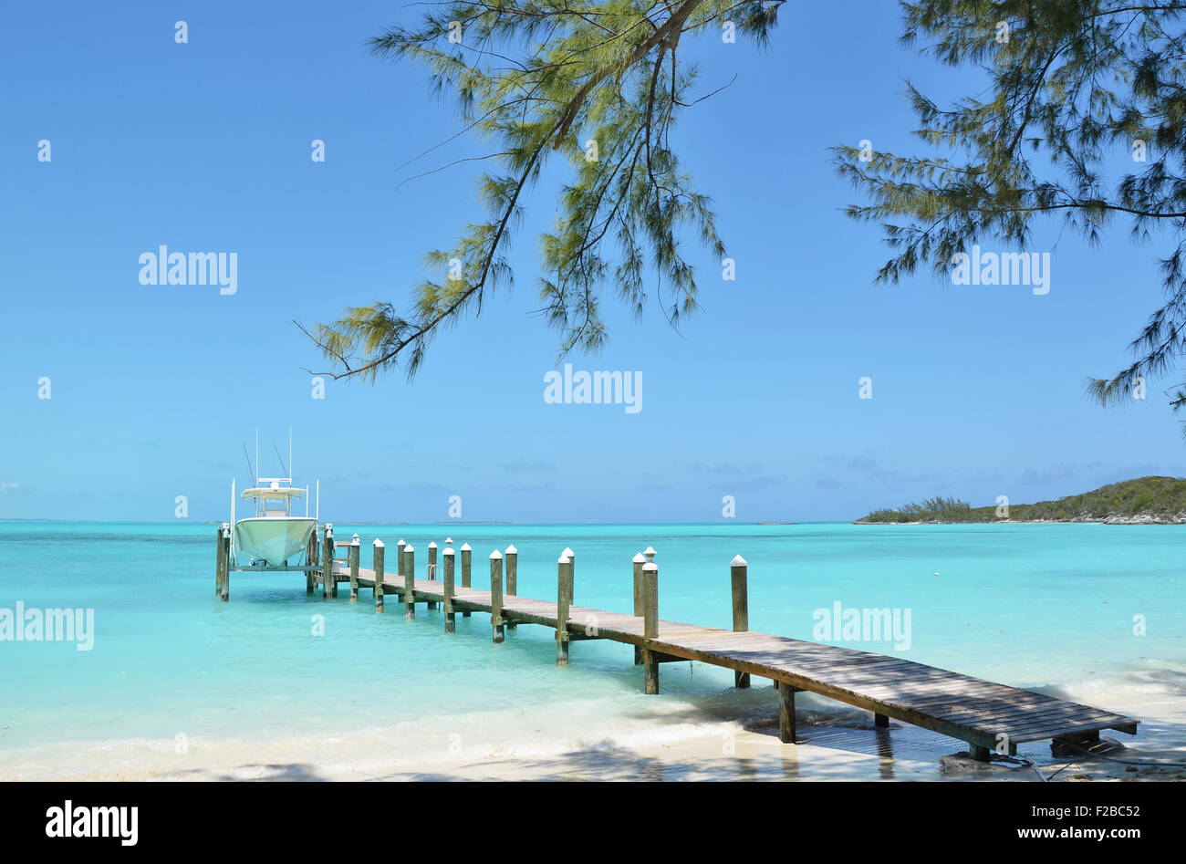 Yacht at the wooden jetty. Exuma, Bahamas Stock Photo