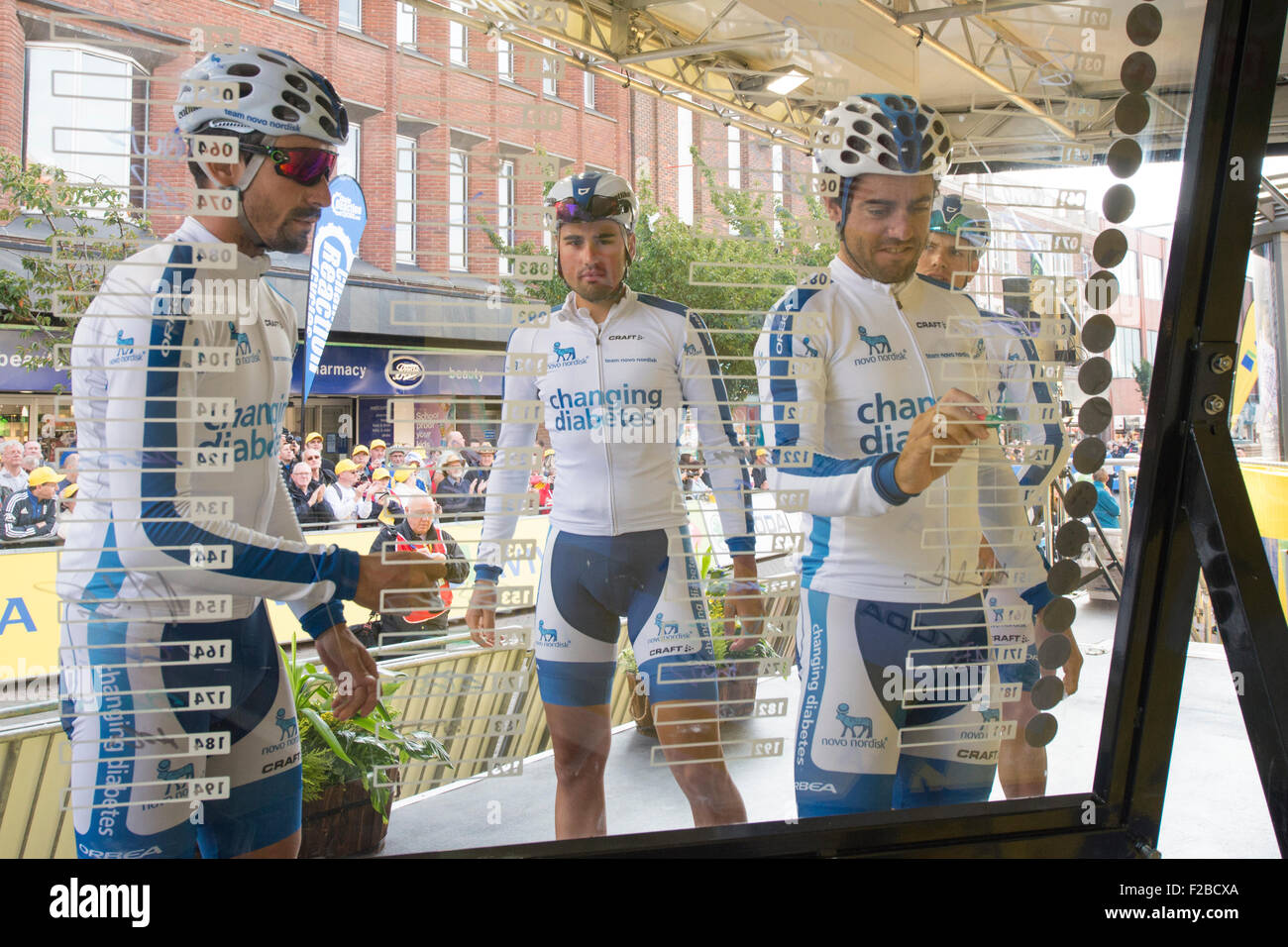 Cyclists from Team Novo Nordisk sign on before stage 6 of the 2015 Aviva Tour of Britain between Stoke-on-Trent & Nottingham, UK Stock Photo