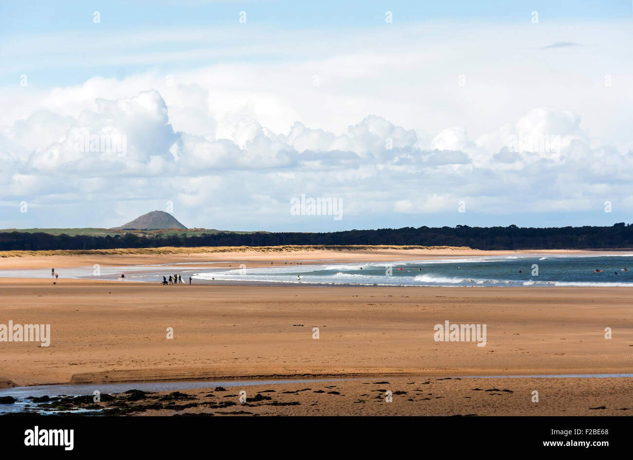 Low tide at Belhaven beach, West Barns, on the John Muir Way, near Dunbar, East Lothian, Scotland. North Berwick Law is in the distance. Stock Photo