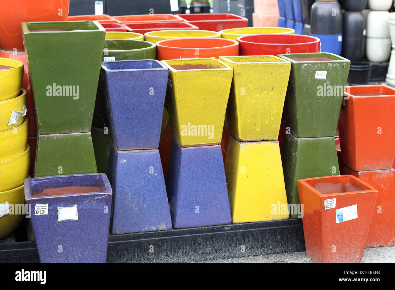 Colourful Terracotta pots for sale at nursery Stock Photo Alamy