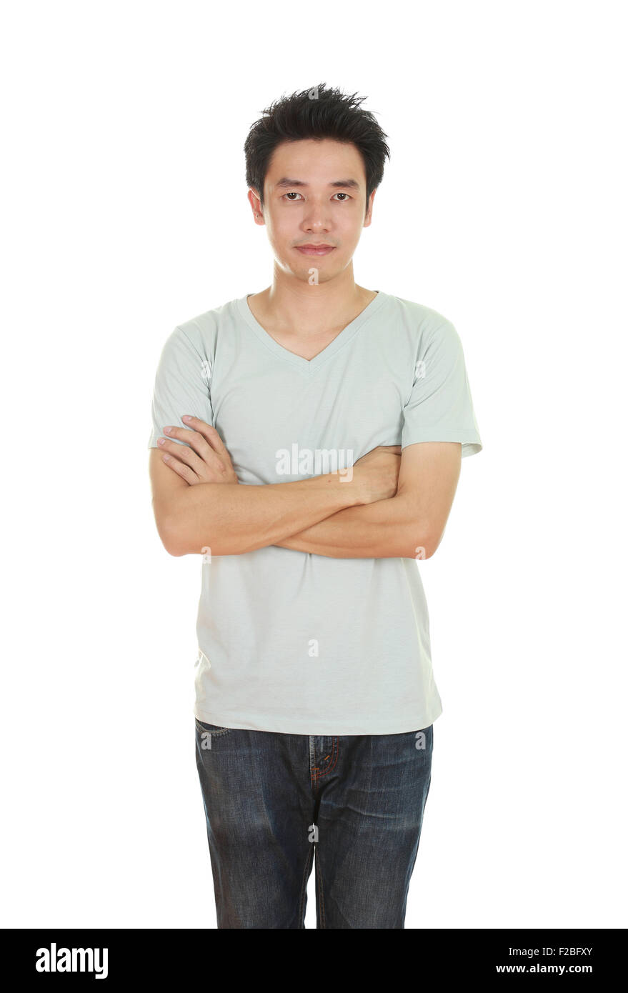 man with arms crossed, wearing t-shirt isolated on white background. Stock Photo