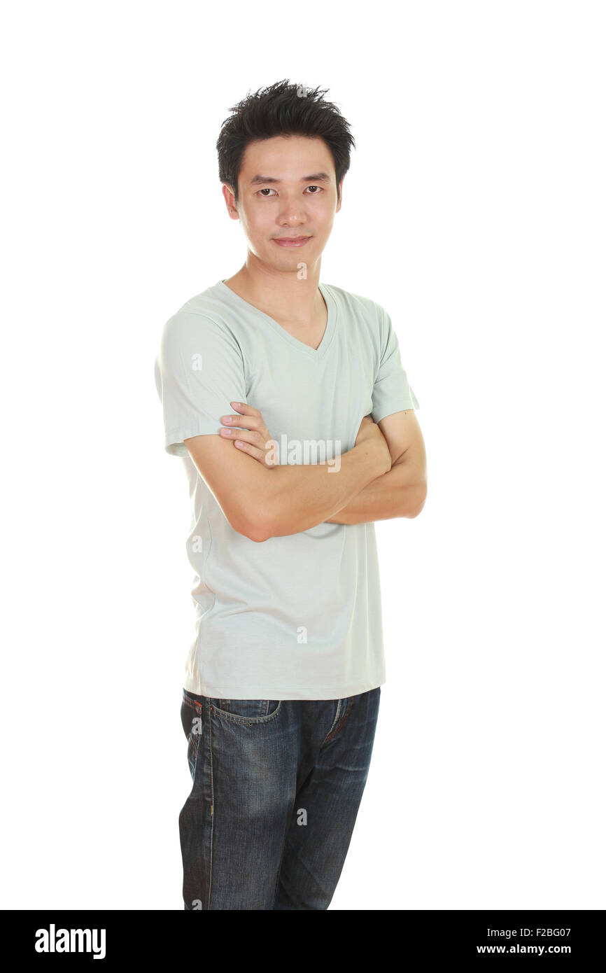 man with arms crossed, wearing t-shirt isolated on white background. Stock Photo