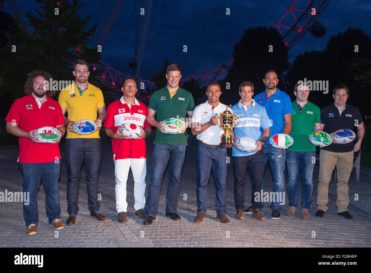 London, UK. 15th September 2015. (L-R) Adam Jones (Wales), James Horwill (Australia), Masaaki Sakata (Japan), Bob Skinstad (South Africa), Jason Robinson (England), Gonzalo Camacho (Argentina), Marco Bortolami (Italy), Gordon D'Arcy (Ireland) and Andrew Mehrtens (New Zealand) during the launch of the Rugby World Cup 2015 as the event takes over the Coca-Cola London Eye. The six week tournament hosted in England and Cardiff between September 18 and October 31 with 20 teams competing to win the coveted Webb Ellis cup that has been on a Trophy Tour around the UK for 100 days. Credit: Elsie Kibue  Stock Photo