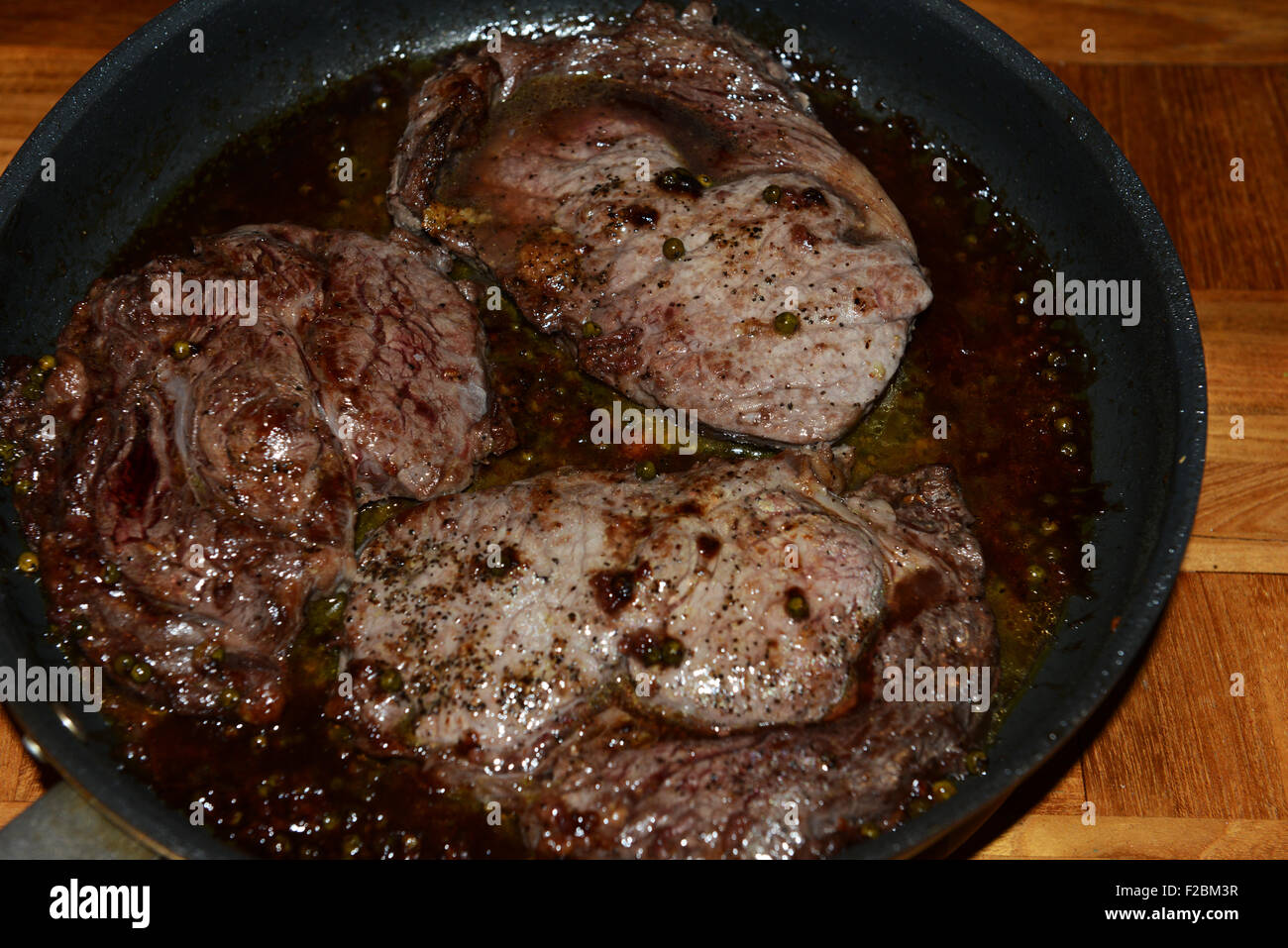 Ribeye steak in French wine & pepper sauce Stock Photo Alamy