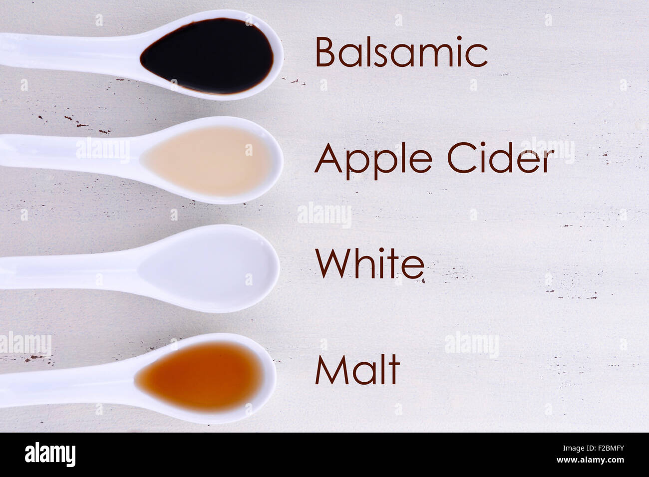 Serving size samples of different types of vinegar including Balsamic, Apple Cider, White and