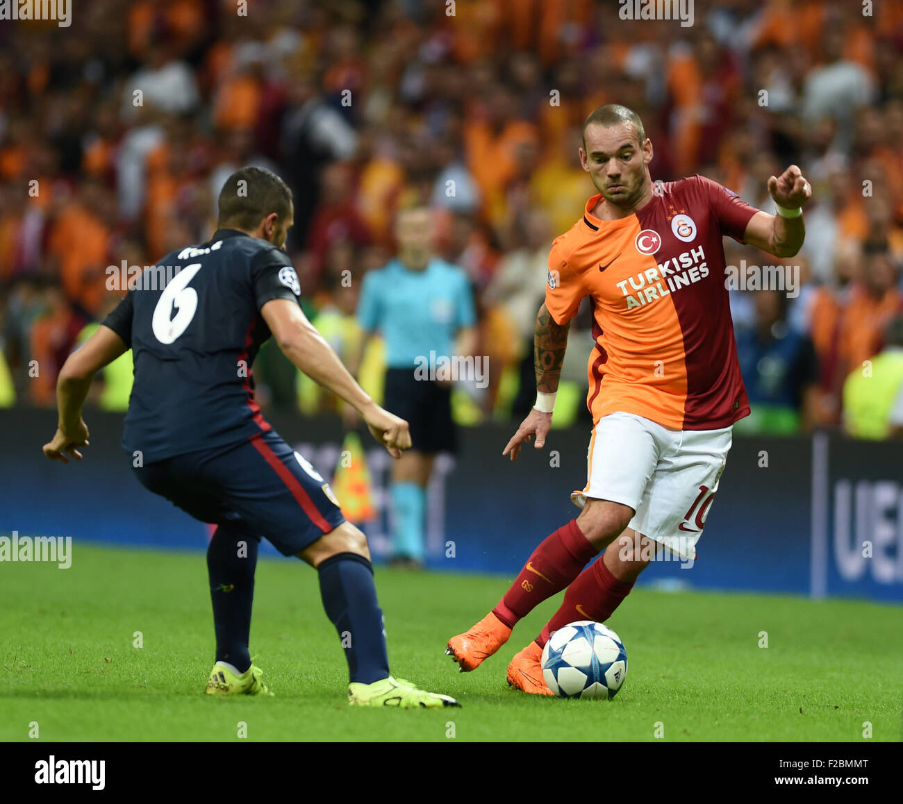 (150916) -- ISTANBUL, Sept. 16, 2015(Xinhua) -- Wesley Sneijder (R) of Turkey's Galatasaray controls the ball during the UEFA Champions League Group C match against Spain's Madrid Athletic in Istanbul, Turkey, on Sept. 15, 2015. Madrid Athletic won 2-0. (Xinhua/He Canling) Stock Photo