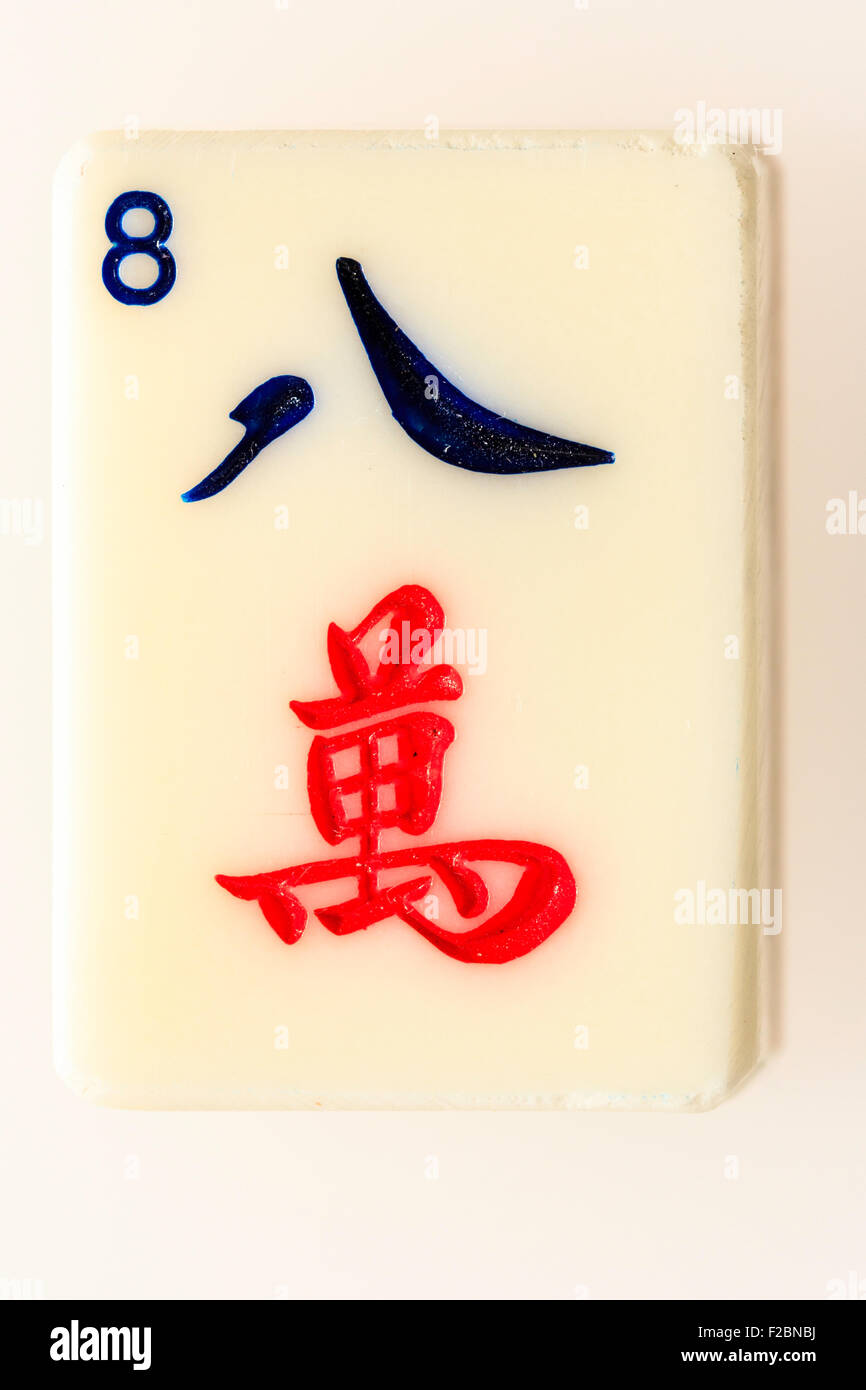 Close up of single card or tile on plain white background from a Mahjong  set, character, myriads, cracks, set, number eight, 8 Stock Photo - Alamy