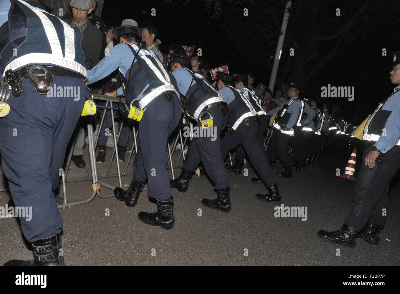 Tokyo, Japan. 15th Sep, 2015. Japanese police officers line up to 